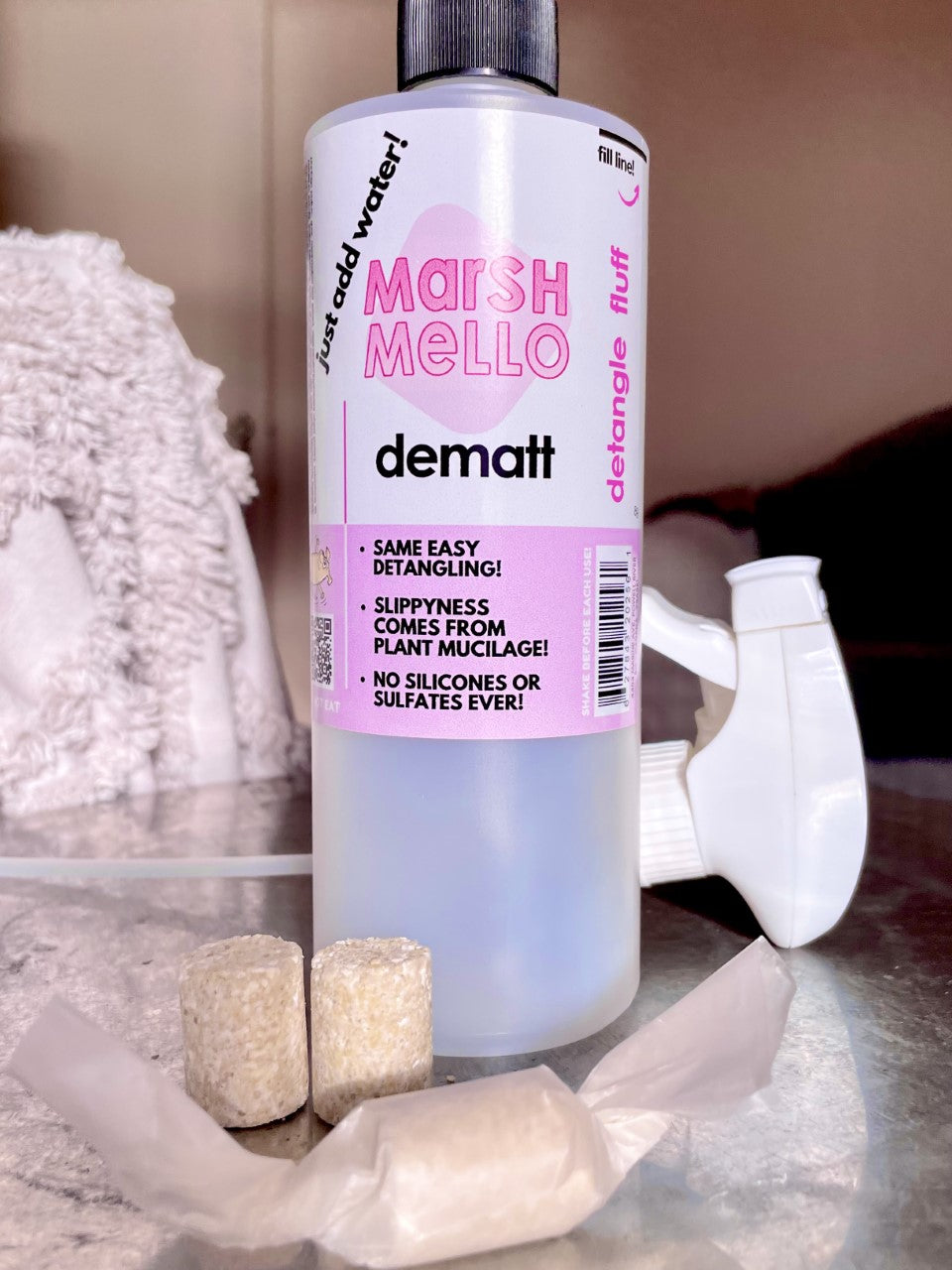 Dog detangling MarshMello spray bottle with extra &#39;rollie&#39; drop-ins